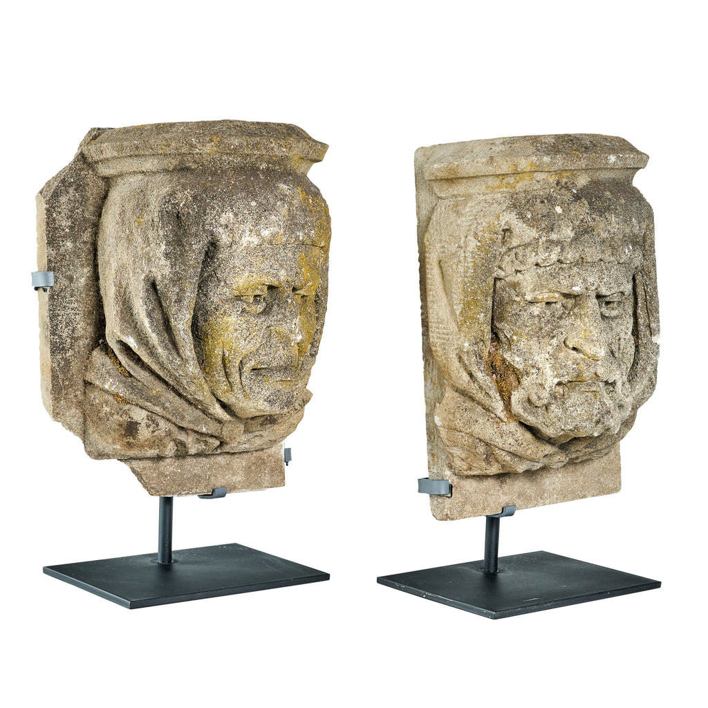 Pair of Carved Limestone Heads from a Building Facade